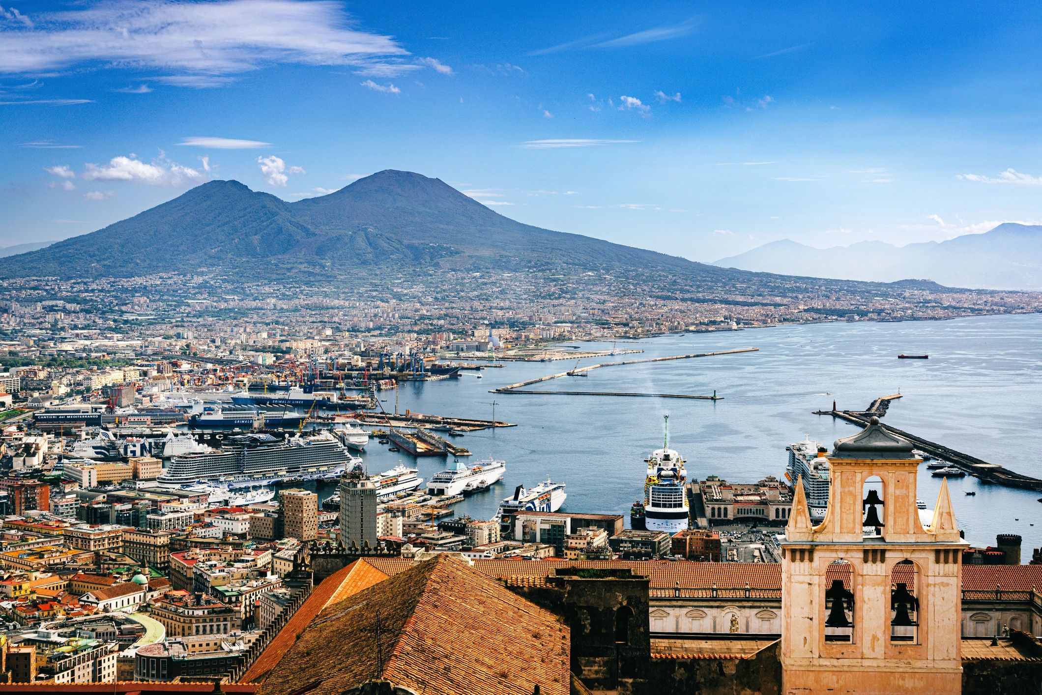 Vivid cityscape showing Naples, Italy, with its harbor